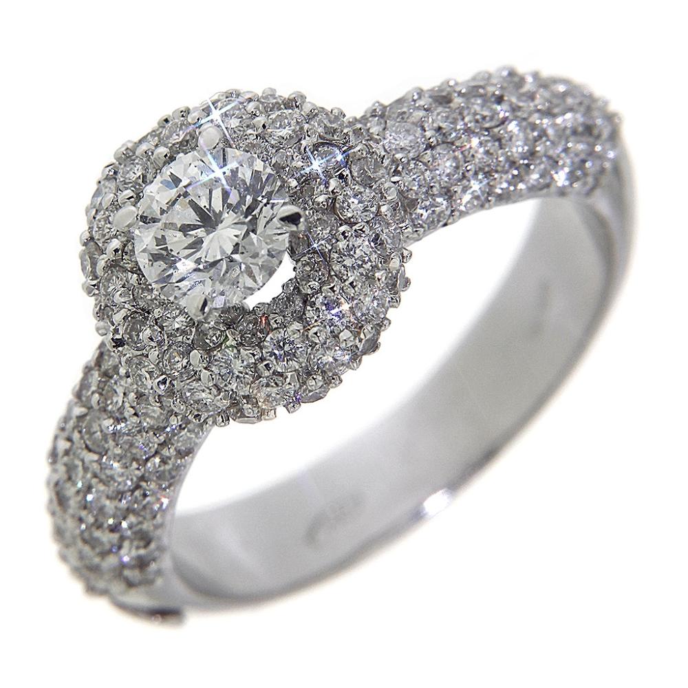 Anello Solitario con Diamante CT 0.64 e Diamanti Laterali CT 1.55