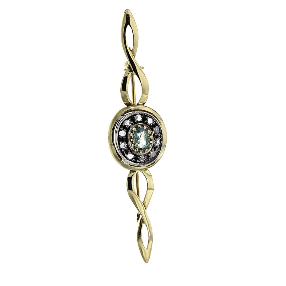 Spilla in Oro 18kt con 10 Diamanti CT 0.22 e 1 Smeraldi CT 0.65