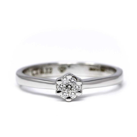 Anello Rosetta Battuta con 7 Diamanti  CT 0.12