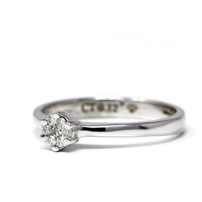 Anello Rosetta Battuta con 7 Diamanti  CT 0.12