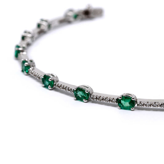 Bracciale Tennis con Smeraldi CT 3.74 Ovali e Diamanti CT 0.40