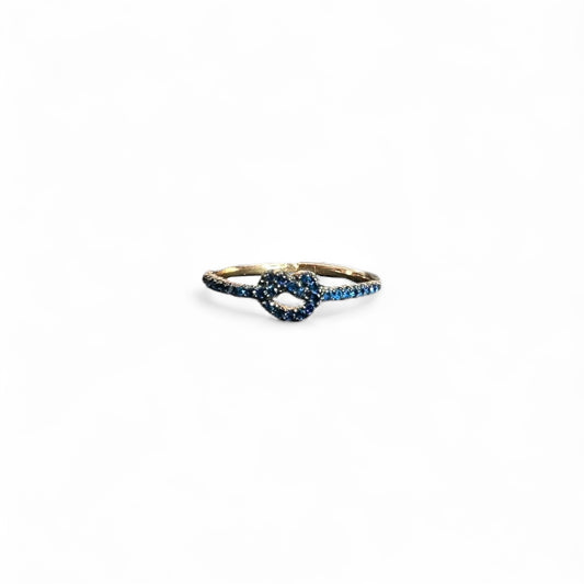 Anello Rosato nodino con zirconi blu