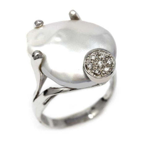 Anello con Perla Barocca e Diamanti CT 0.06