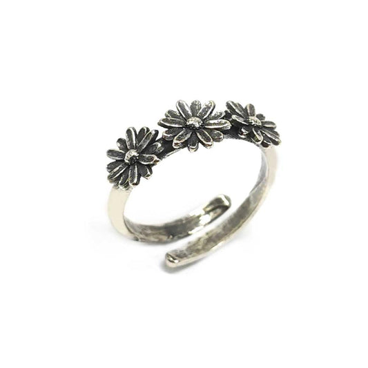 Anello in argento regolabile con fiori bruniti