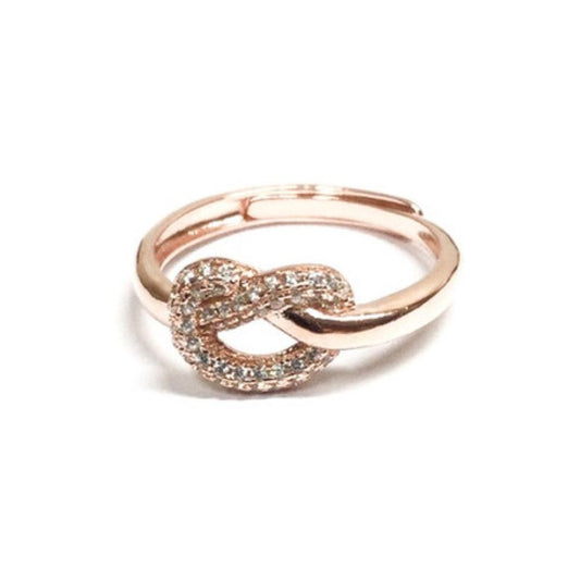 Anello nodo Rosato con zirconi regolabile