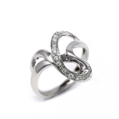 Anello Stilizzato con 16 Diamanti CT. 0.25