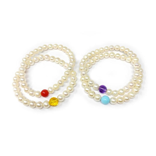 BRACCIALE DI PERLA FRESHWATER 6/6.5 MM A MOLLA CON SFERA CENTRALE
