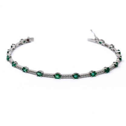 Bracciale Tennis con Smeraldi CT 3.74 Ovali e Diamanti CT 0.40
