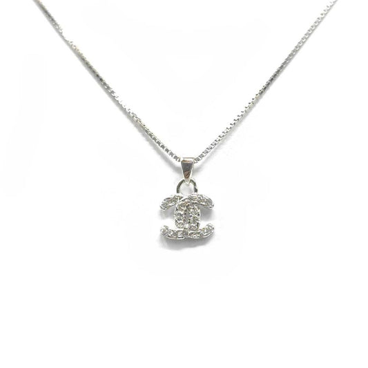 Pendente Chanel in Argento con zirconi