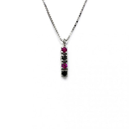 Pendente Stilizzato con 2 Diamanti Neri CT 0.06 e 2 Rubini CT 0.08